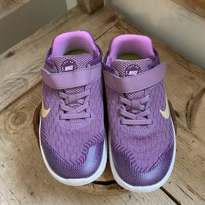 Girls purple NIKE tennis shoes